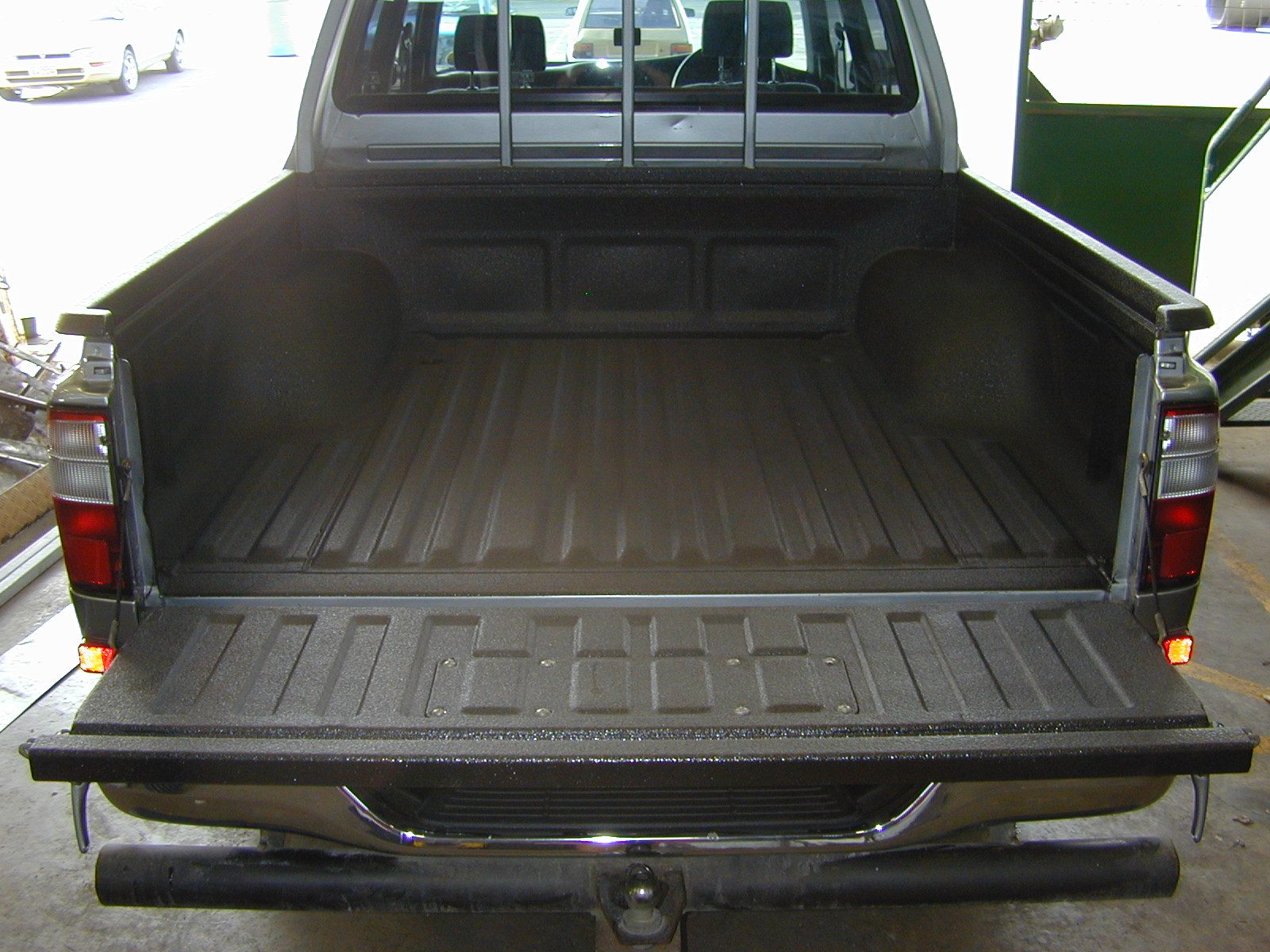 Truck bed sprayed to stop rust spreading